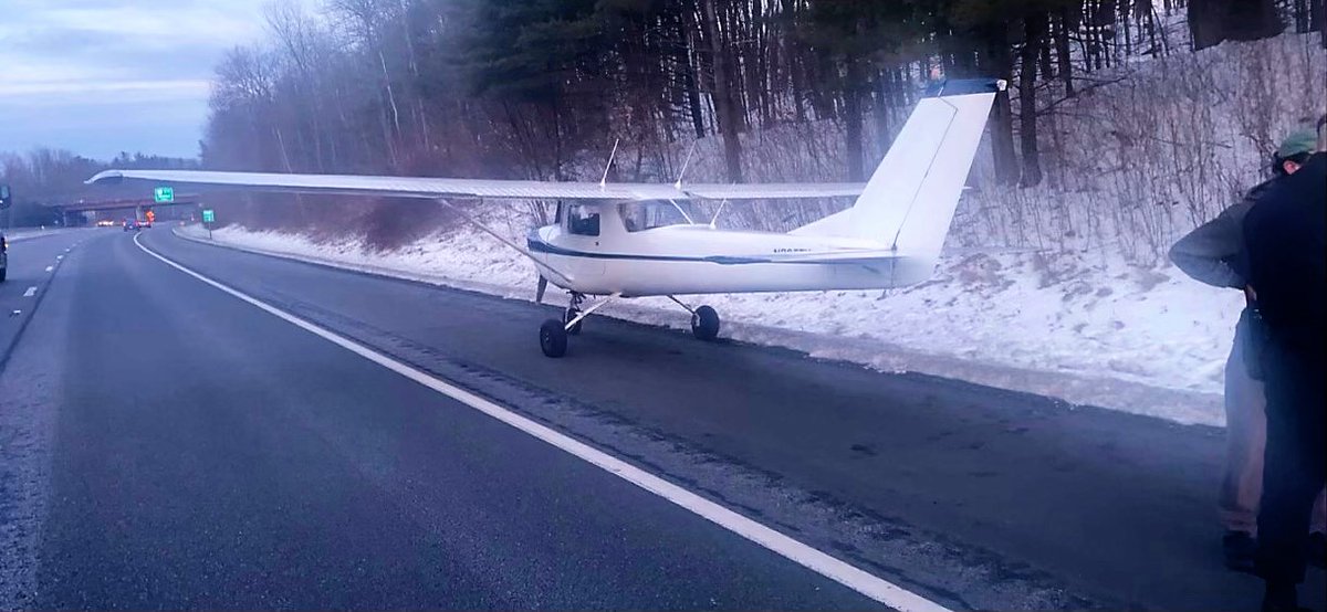 MassStatePolice's tweet photo. #MAtraffic small plane has made a successful emergency landing on Rt 91 in #Greenfield due to mechanical failure. No crash-no injuries to the two occupants. No vehicles involved. Troopers assisted rotating the plane for traffic to pass. Crews en route to remove plane. FAA advised https://t.co/BhFId2TWbk