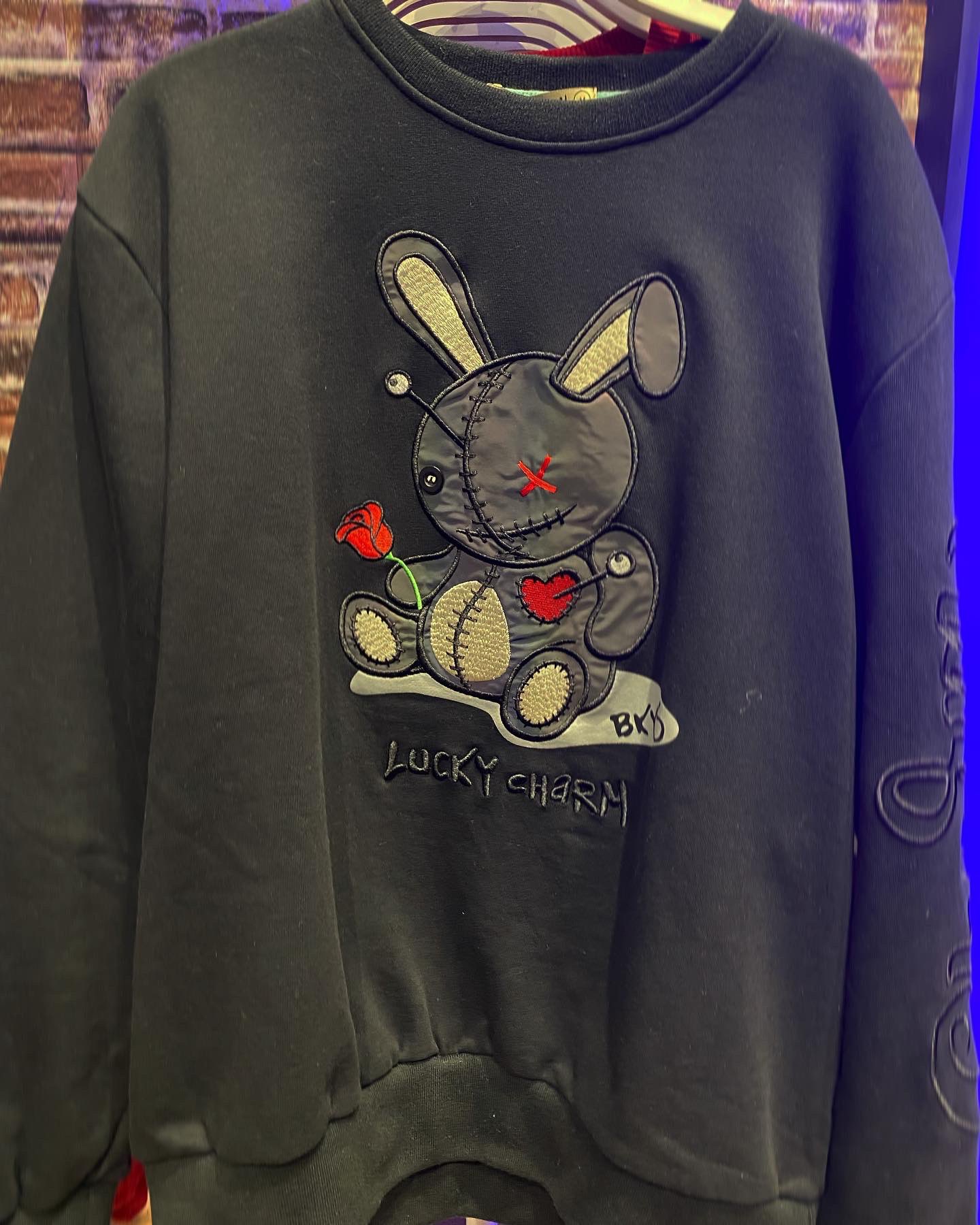 Lucky charm shop sweater