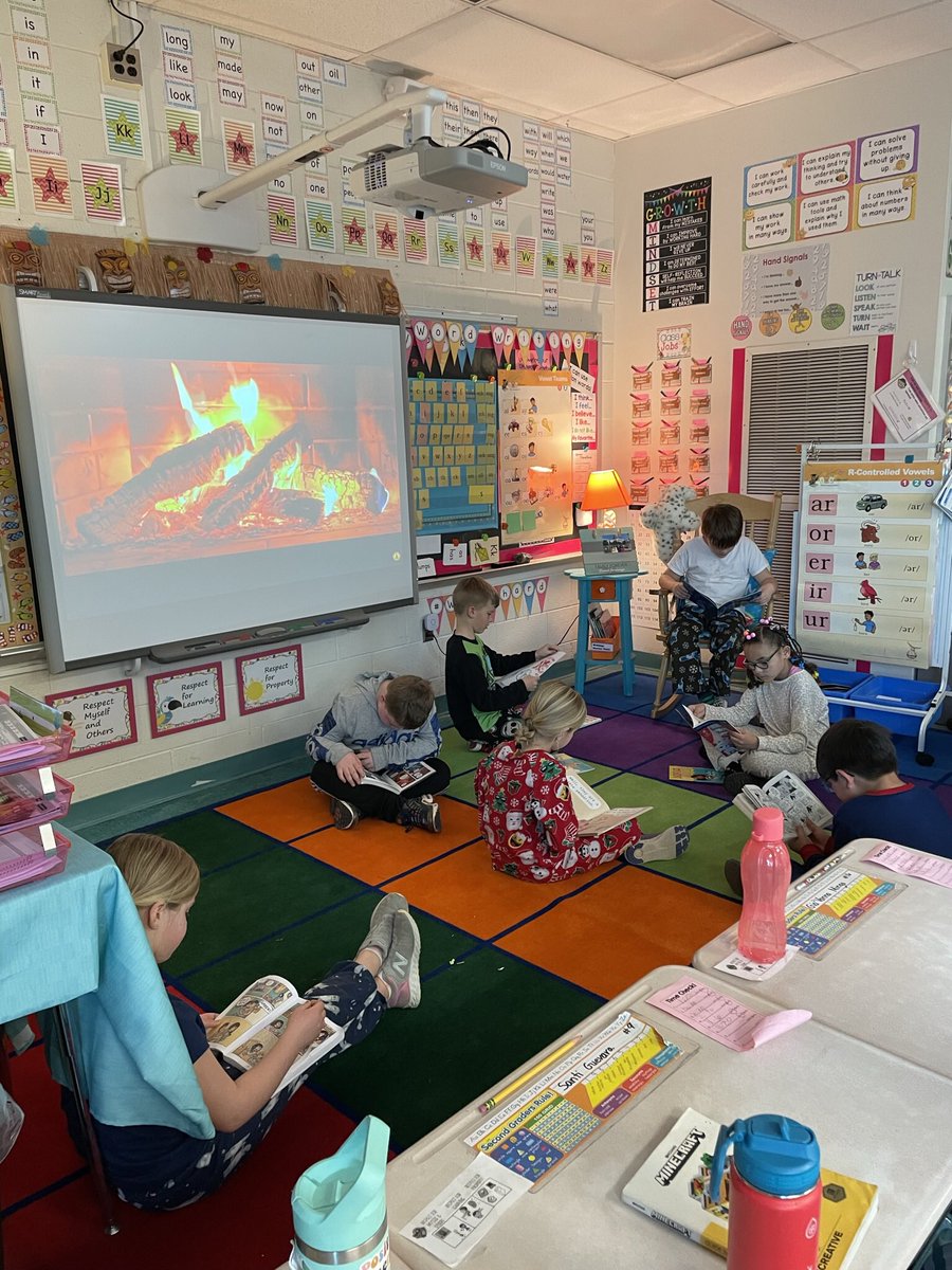 loribalzano's tweet photo. Fireside reading, what a treat for our second graders @DESAACPS https://t.co/clG9CS6gPB