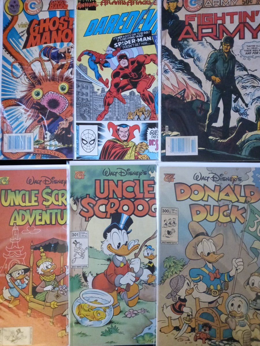 devastation79's tweet photo. few more older comics I pulled earlier to reread. #comicbooks #readingISfundemental
#ghostmansion
#fightingarmy
#daredevil
#unclescrooge
#donaldduck https://t.co/PVbRt8N2B2