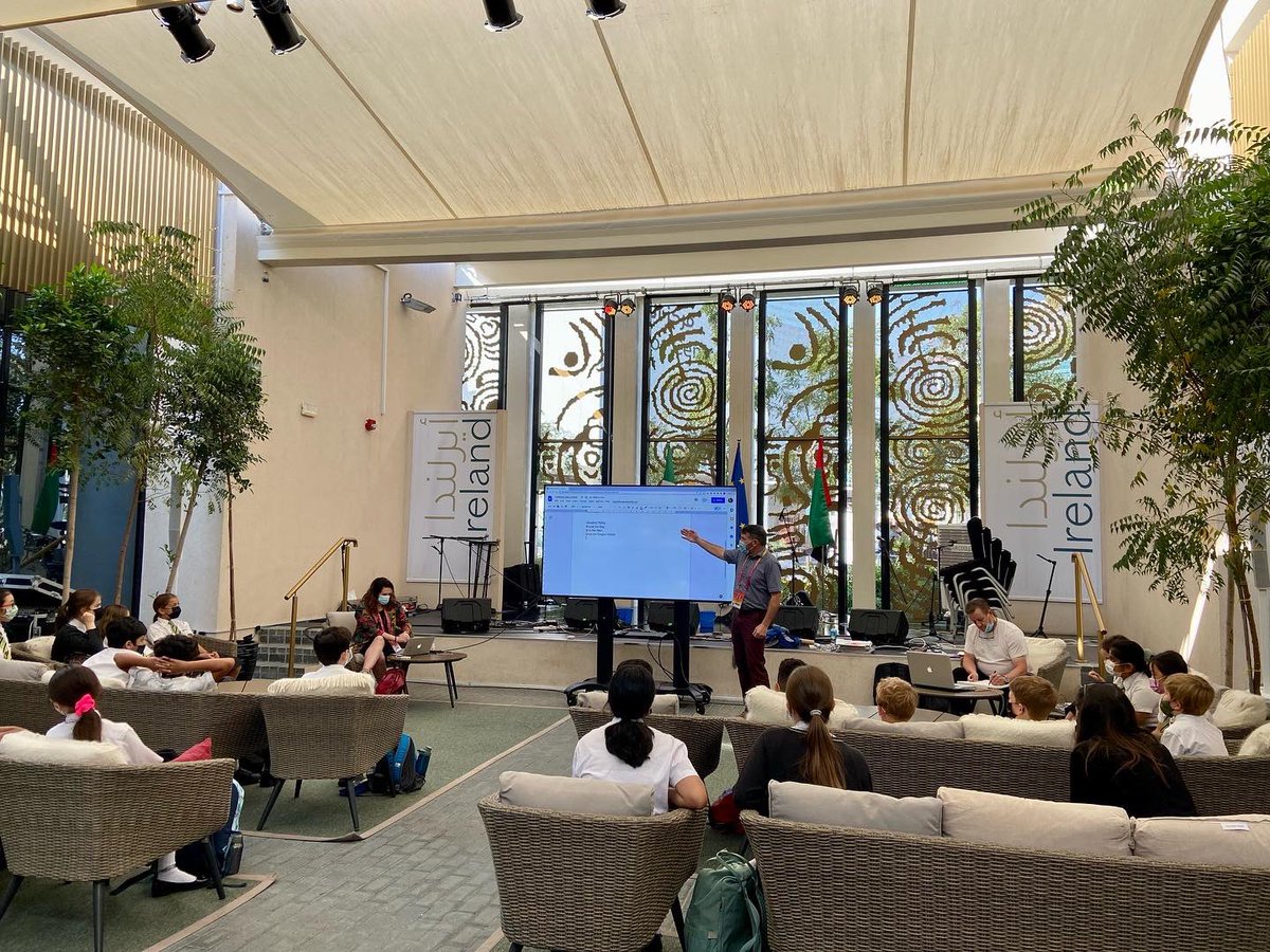 IrelandatExpo's tweet image. An early start this morning as we welcome @HartlandIntl for Day 2 of @FightingWordsIE workshop as part of the Ireland at Expo Programme. 

A very fitting event for #WorldBookDay, as the children write stories while our talented artist Paul sketches along! 🎨 📚 

#TeamIreland