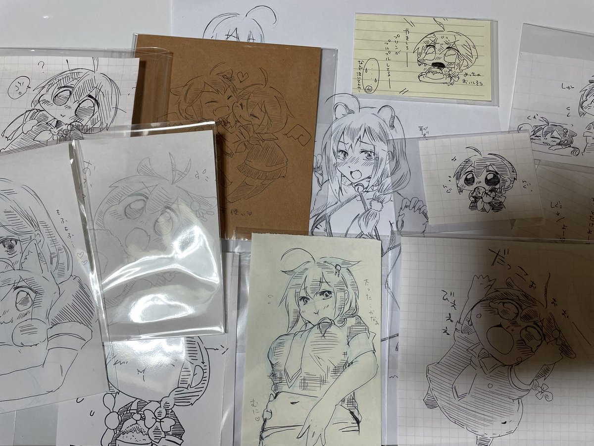 らくがきを袋に入れる作業(イベント行きたい) 