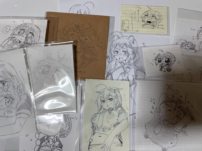 らくがきを袋に入れる作業(イベント行きたい) 