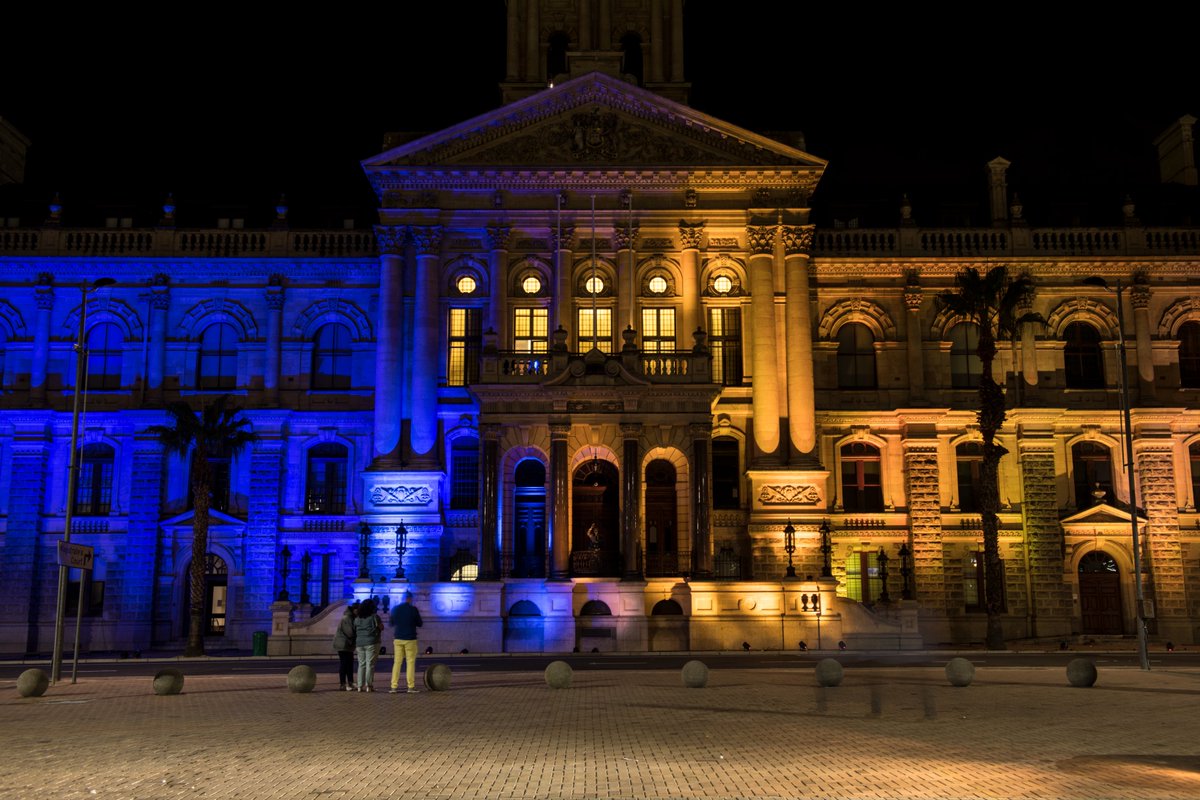 CityofCT's tweet image. Last night, City Hall was lit up in solidarity with Kyiv and Ukraine. 

"The City is united with governments across the free democratic world, calling for an end to Russia’s illegal invasion, which has caused over 3000 civilian causalities." - Mayor @geordinhl 

#CTNews