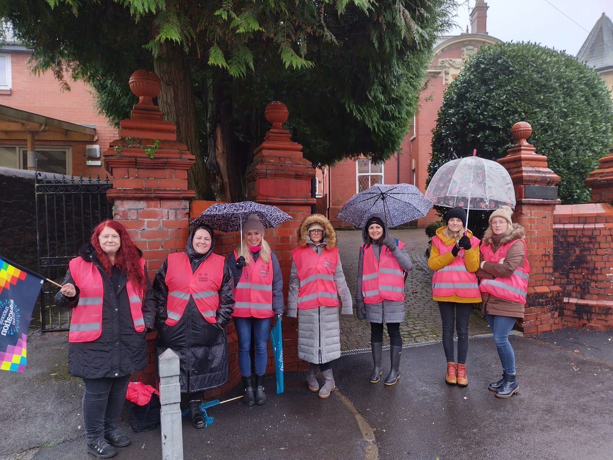 NEUCymru's tweet photo. The rain hasn't dampened the spirits of @NEUCymru members from @HowellsSchool who are on their 4th day of strike action as @GDST will not negotiate with ACAS @NEUnion #23Together #HandsOffOurTPS #StopFireRehire https://t.co/lJAGbg342s