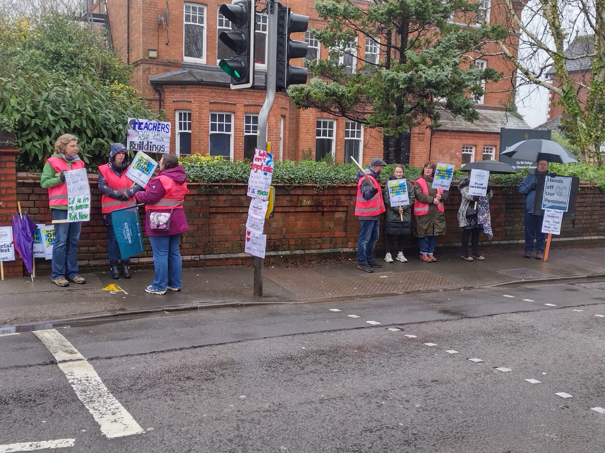 NEUCymru's tweet photo. The rain hasn't dampened the spirits of @NEUCymru members from @HowellsSchool who are on their 4th day of strike action as @GDST will not negotiate with ACAS @NEUnion #23Together #HandsOffOurTPS #StopFireRehire https://t.co/lJAGbg342s