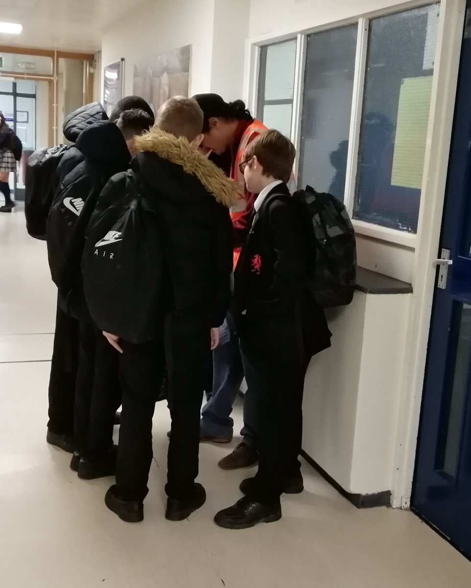 Chacecommunity's tweet photo. What is happening here? It's World Book Day! It's break time and these students are talking to Mr Subasinghe about his favourite book. #belonging #Chacevalues #readingforpleasure #readingforlearning https://t.co/XwvHB0QcMY