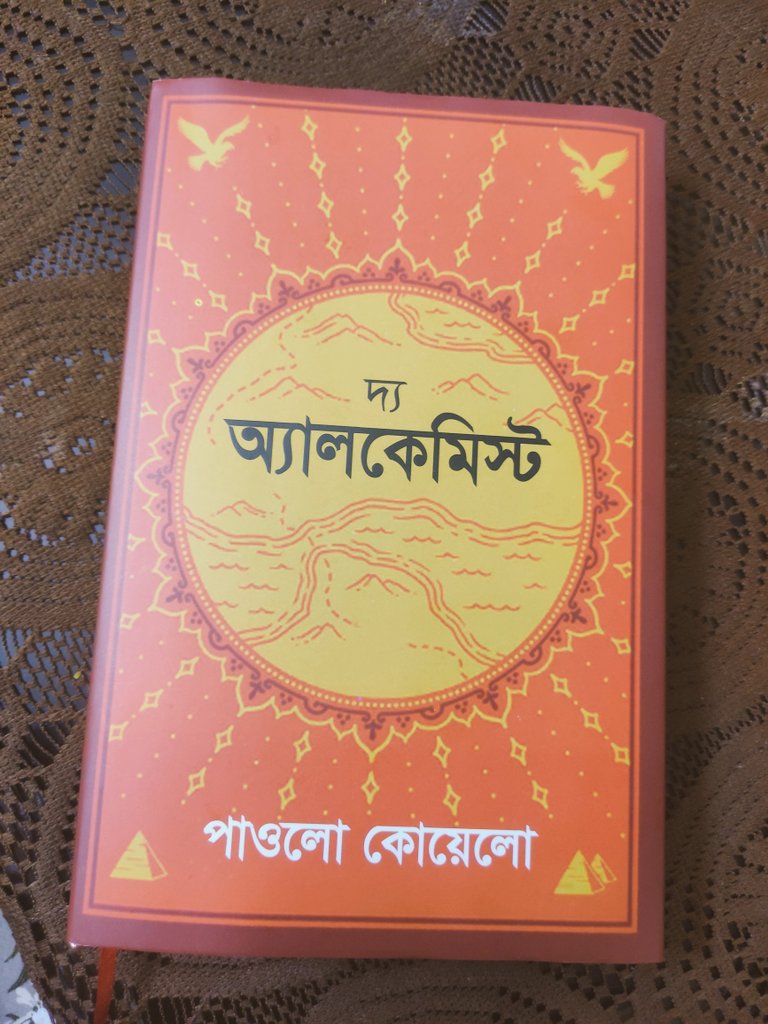 This is Bangla translation of The Alchemist written by <a href="/paulocoelho/">Paulo coelho</a> 
I am so much loving this story. 💜