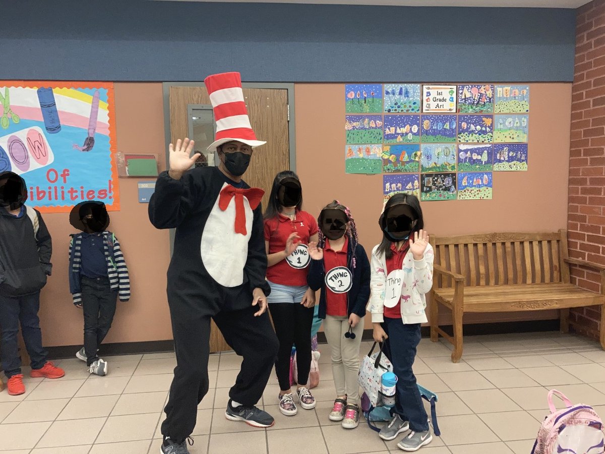 Shark_Library's tweet photo. Mr. Ingram, our amazing "Cat in the Hat" has fun with Thing 1 and Thing 2! https://t.co/puRYGjlUEY