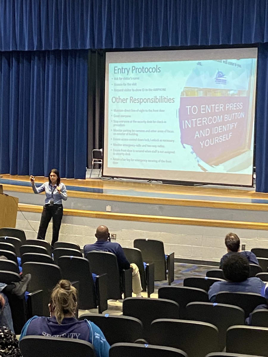 Christi Golden teaching Front Desk Expectations for our Security Assistants.