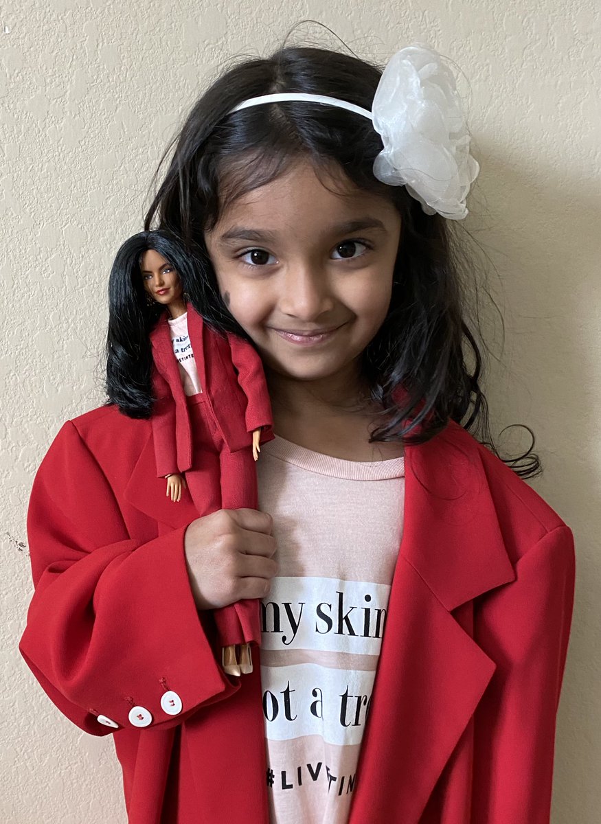 This little girl holding the first South Asian American CEO Barbie is why representation matters.