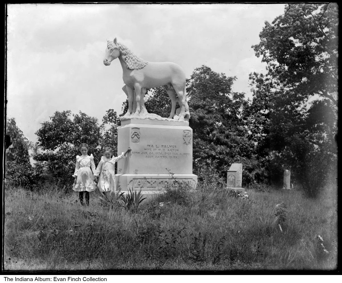 HistoricInd's tweet image. This unique gravestone belongs to Ina Palmer who is buried in Mt. Zion Cemetery in Richland City. She was married to William H. Axton &amp;amp; had two daughters, Hallie Dee Axton and Hazel Marie Axton—probably the same girls pictured in this c.1900-1905 photo.

Photo from @IndianaAlbum