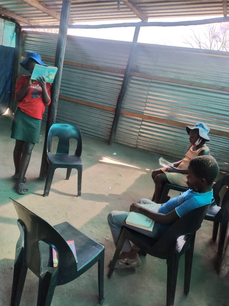 siwebh's tweet photo. Celebrating #WorldBookDay @BethCovenant strives to encourage a culture of reading amongst children, grateful to @kpczim @elvis_ndebele for strategic partnership. Ngozi Mine children improving daily. #books #education https://t.co/eiaYXAwXbJ