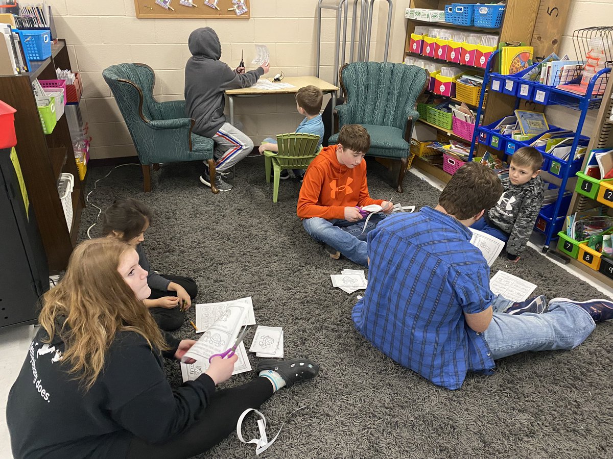 8th graders helping 1st graders assemble a book, read a book and talk about the lesson of the story. <a href="/LukeLutterman/">Luke Lutterman</a> #ReadAcrossAmerica #WeAreTriton