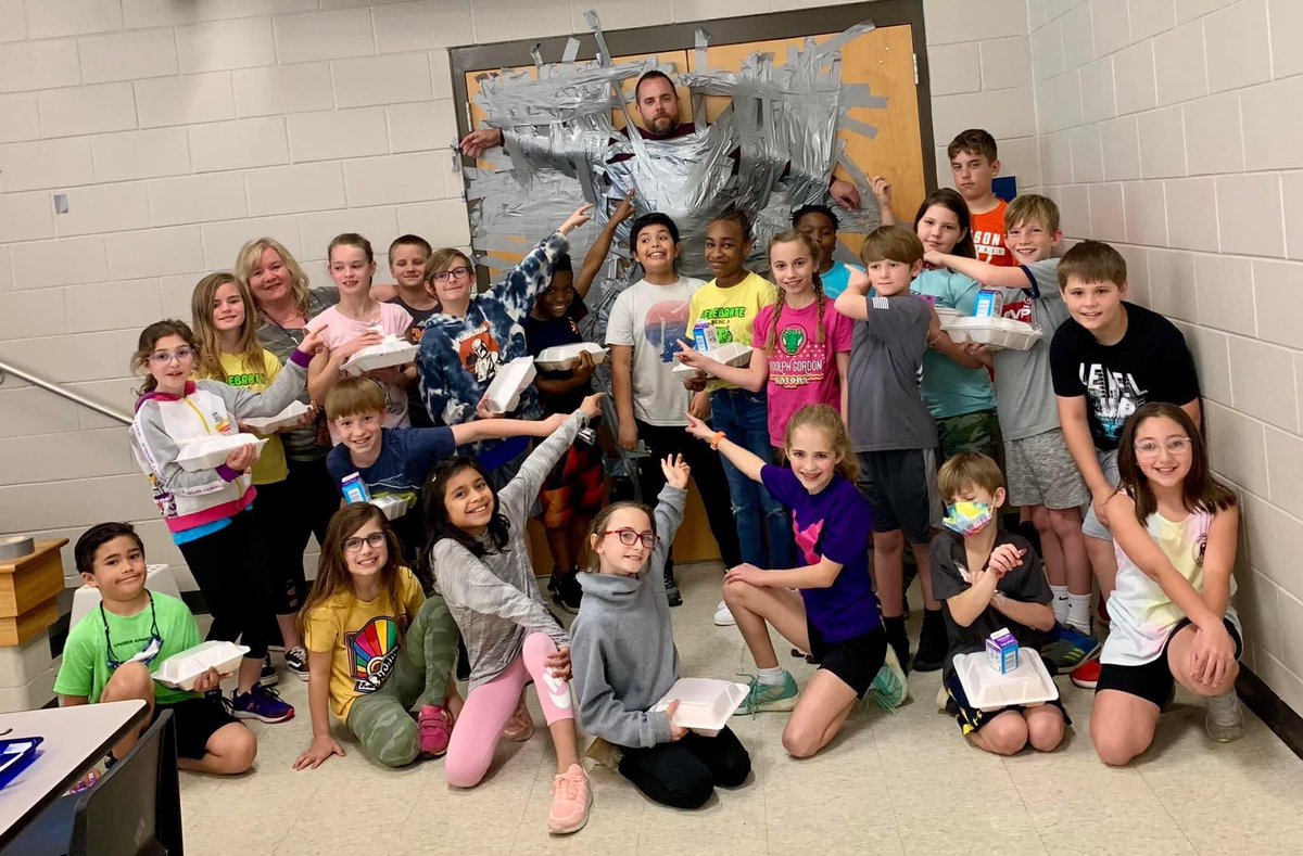 RhondaRRhodes's tweet photo. I think the number of strips of tape really means how much our Assistant Principal @Dja4260 Mr. Anderson is loved @GordonGators! #GatorGreatness https://t.co/JulHcdHmx2