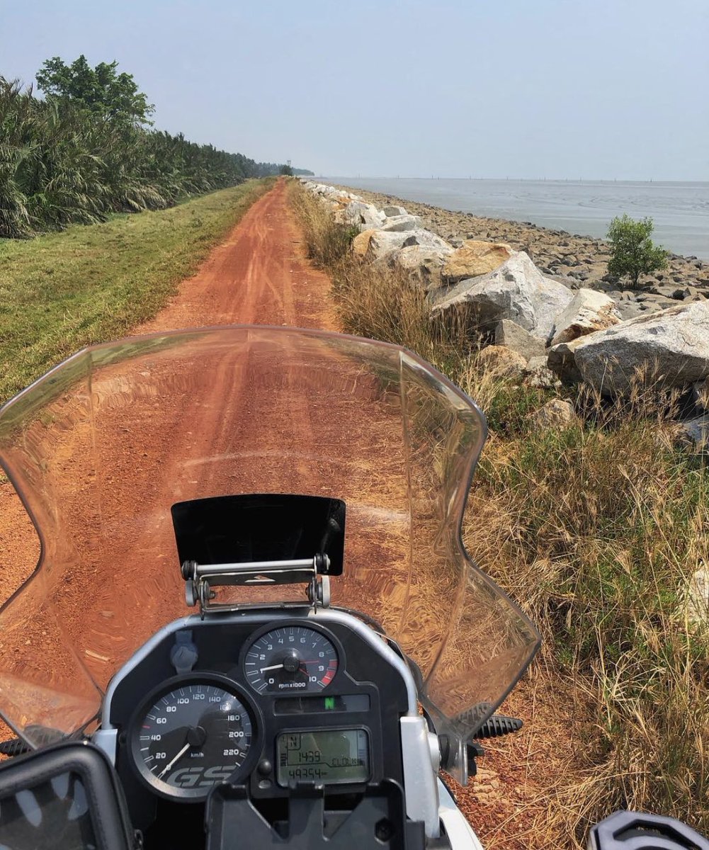 A beautiful trail on the West coast of Malaysia. Often need to slow down so the monitor lizards take their time to go back to the bush.