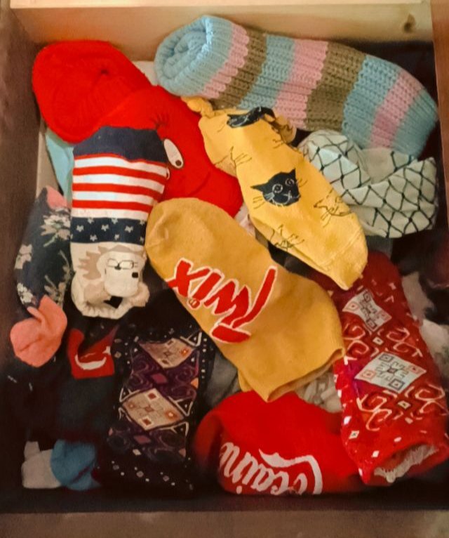 Solidarity from a proud owner of hundreds of socks. (Yes, that one pair says cocaine 🥵)