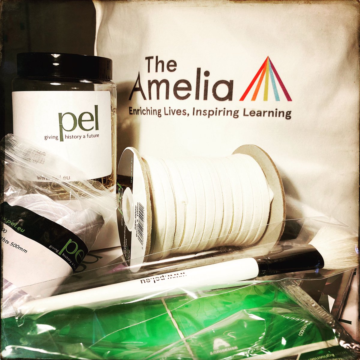 SouthboroughSoc's tweet photo. Huge thank you to  the @theamelia_tw for inviting us to participate in their archive workshops. To top it all off - a goodie bag full to support our archiving…brass paper clips, dusting brush, cotton tape, archive boxes, polyester pockets, snake weight and even insect traps! https://t.co/Rz327dGuF0