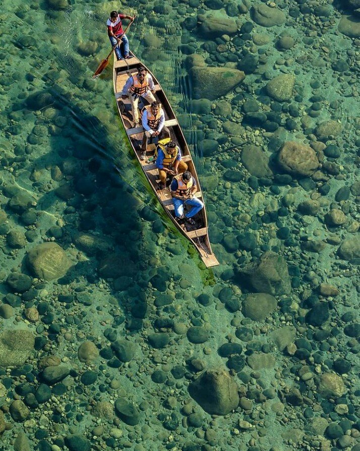 One of the cleanest river water in the world where boats seems to be floating in the air

Friends can you guess the name of location ?