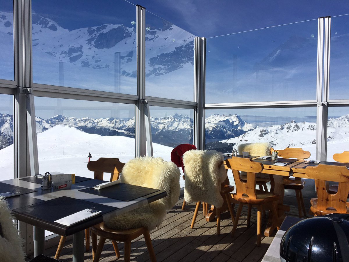 Day 2 in #Verbier We made it despite long delays due to #StormEunice Awesome lunch with a beautiful view of the mountains today. 
Keeping up with the teenagers is now an exercise in futility 🏂⛷😩