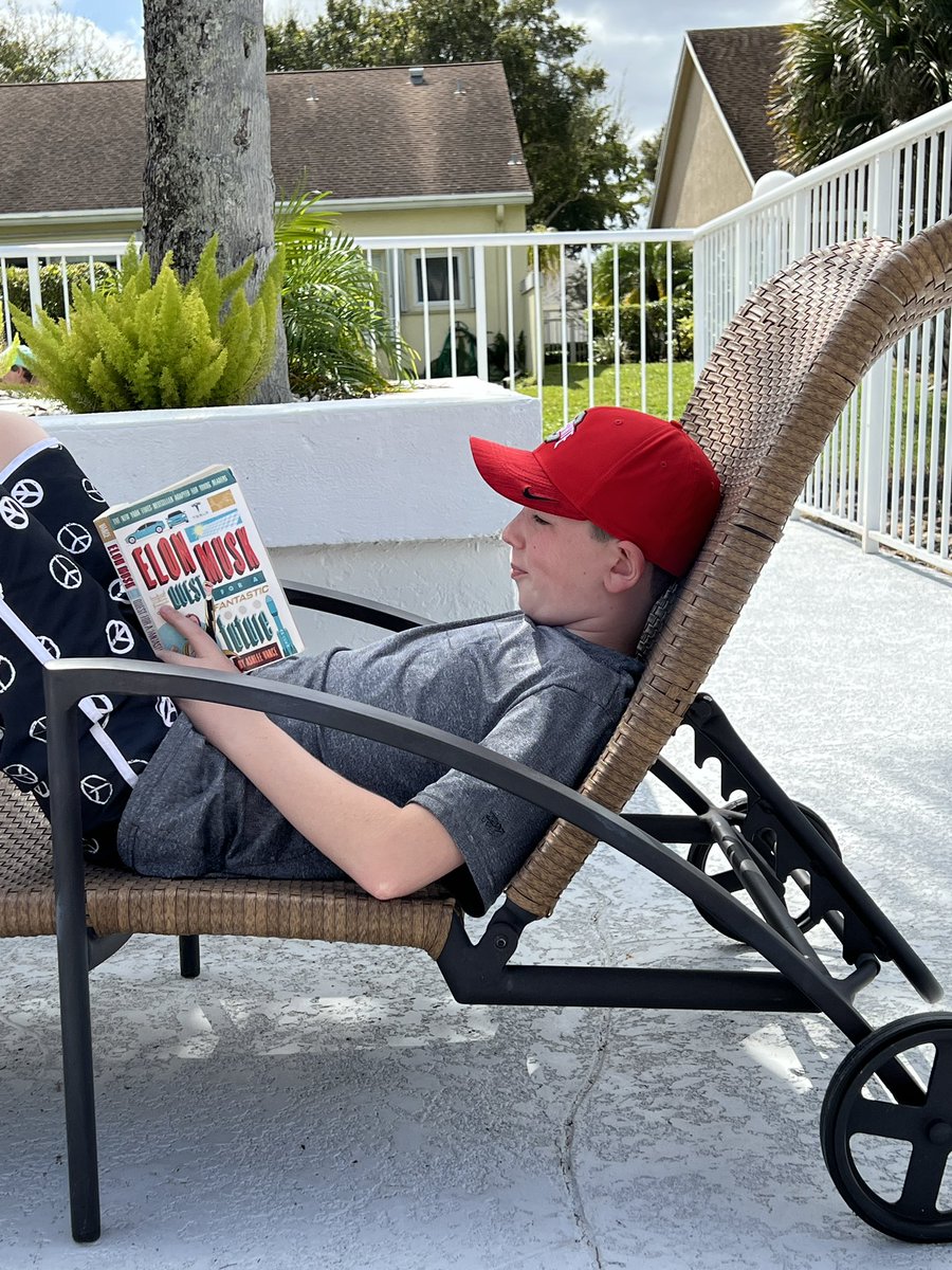 One of the best views a mom can have while on vacation! 📚 ❤️#booklove <a href="/elonmusk/">Elon Musk</a>