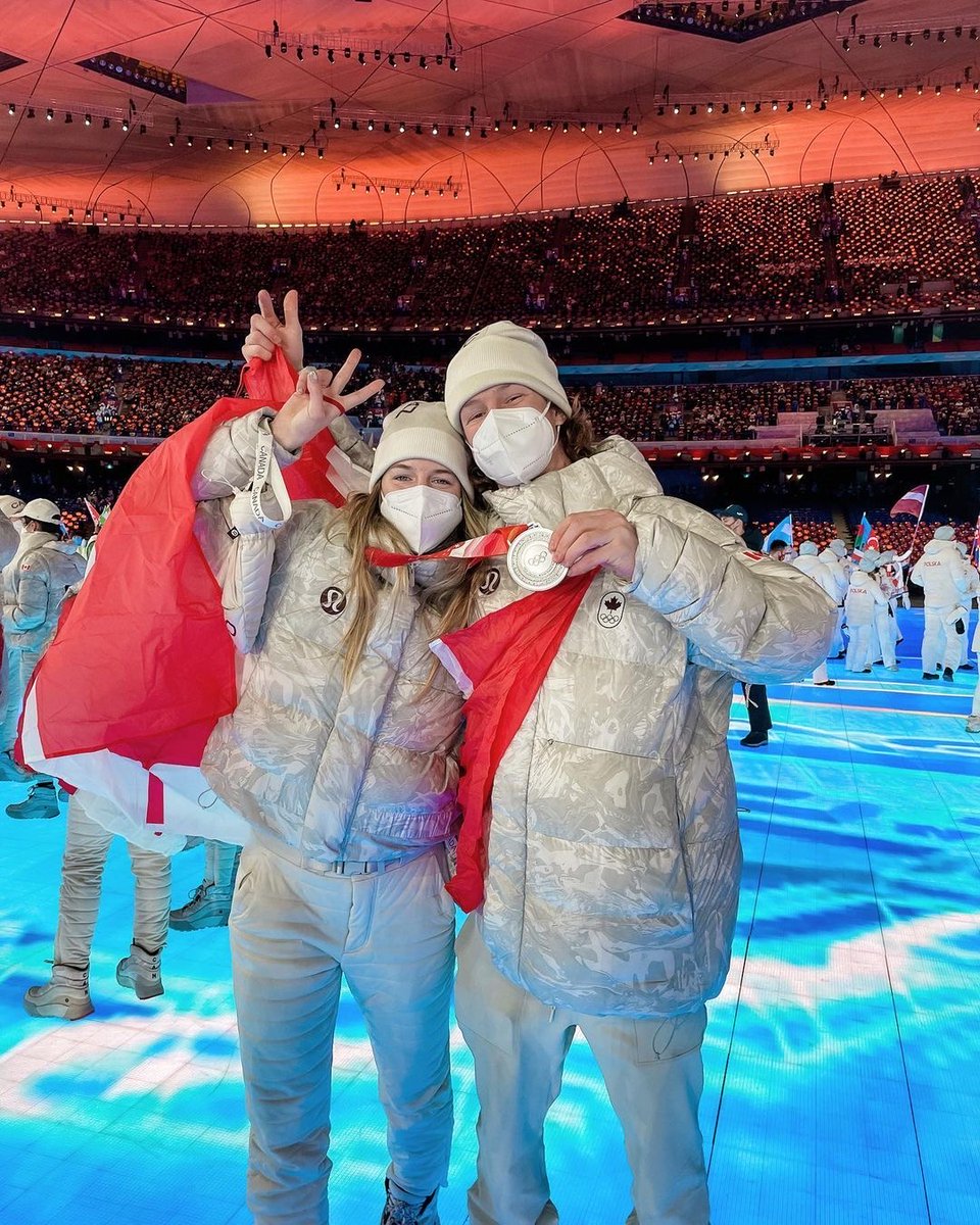 TeamCanada's tweet photo. Now THAT is a dynamic duo 🤩

Siblings, Cassie and Darcy Sharpe walked into the closing ceremony together repping the 🍁

📸: @cassiesharpe / Instagram https://t.co/jugj2aIKLe