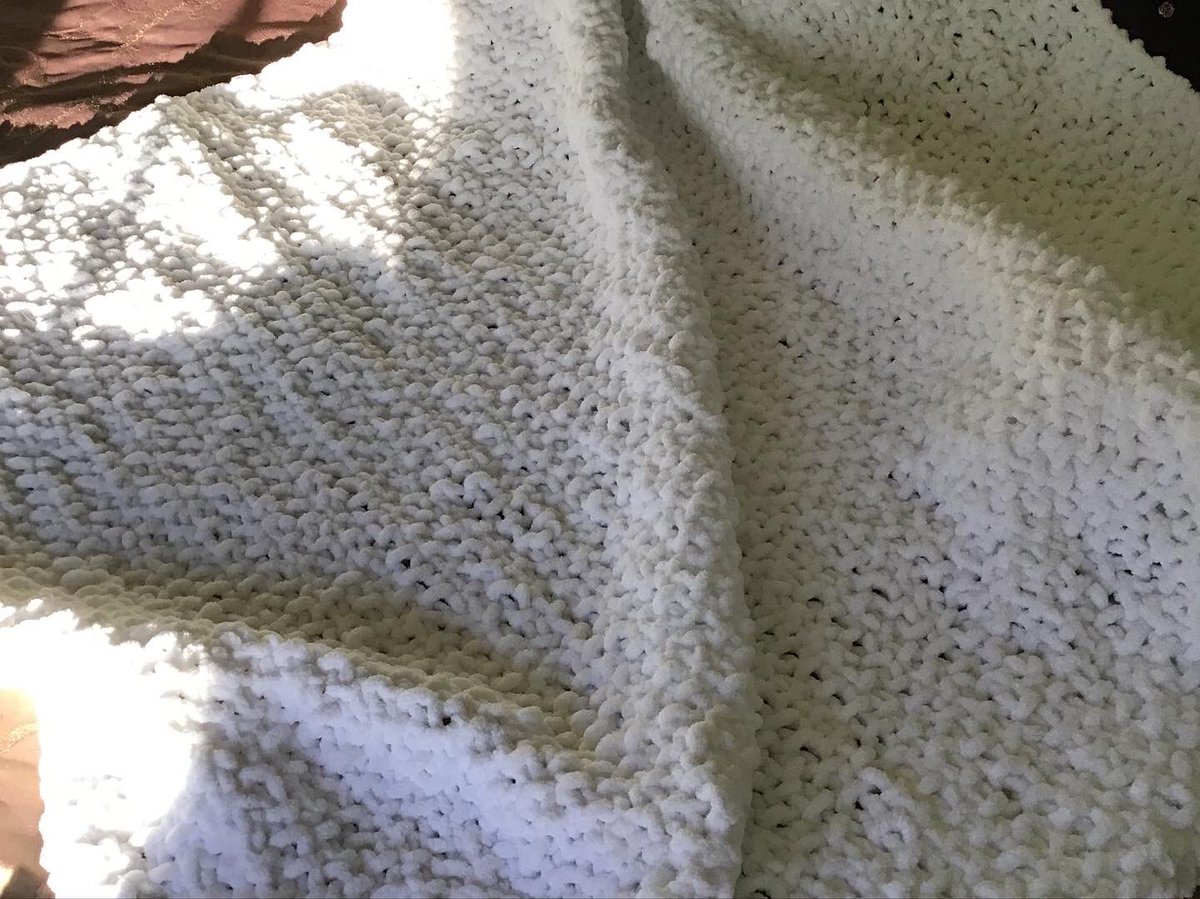 P_Hendrickson's tweet photo. When nature mimics art (or crafts, anyway). Pic 1: remnants of Friday night’s snow squall. Pic 2: Afghan I just finished for my sister, appropriately enough in @LionBrandYarn’s #CoverStory in #Snow. #writerswhoknit #knitting #winter https://t.co/rRGQ4vRvSy