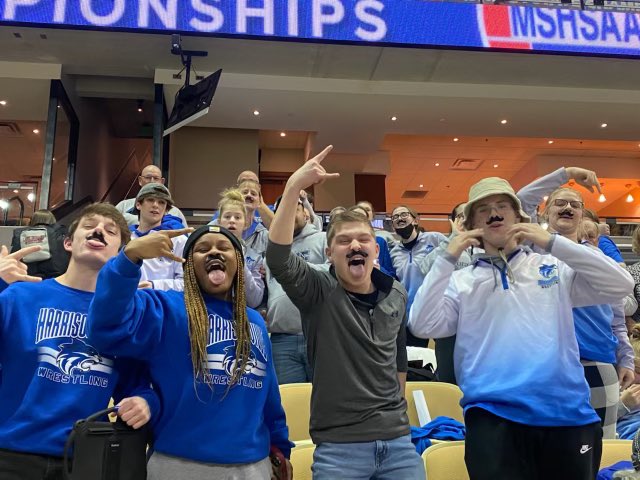 HvilleSchools's tweet photo. A bit of fun from State Wrestling - evidently all @carson_miller4’s opponents had mustaches so his teammates &amp; fans decided to get into the spirit with their own. #WildcatFamily 🥸💙 https://t.co/Zr3MpcE949