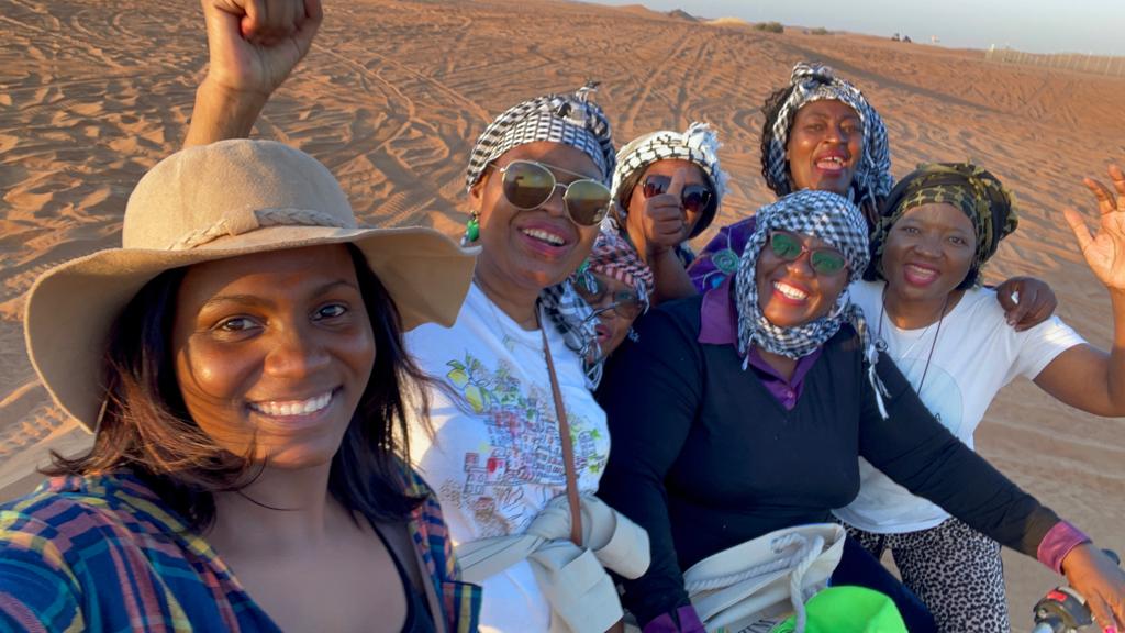 womensbankzim's tweet photo. Zimbabwe Women's Microfinance Bank Chief Executive Officer Dr M Marikanda( the Biker) enjoying a Desert Ride Experience in Dubai with some of the Clients financed by the Bank.
#CreatingAWomanwithPower https://t.co/otKrfrnrHP