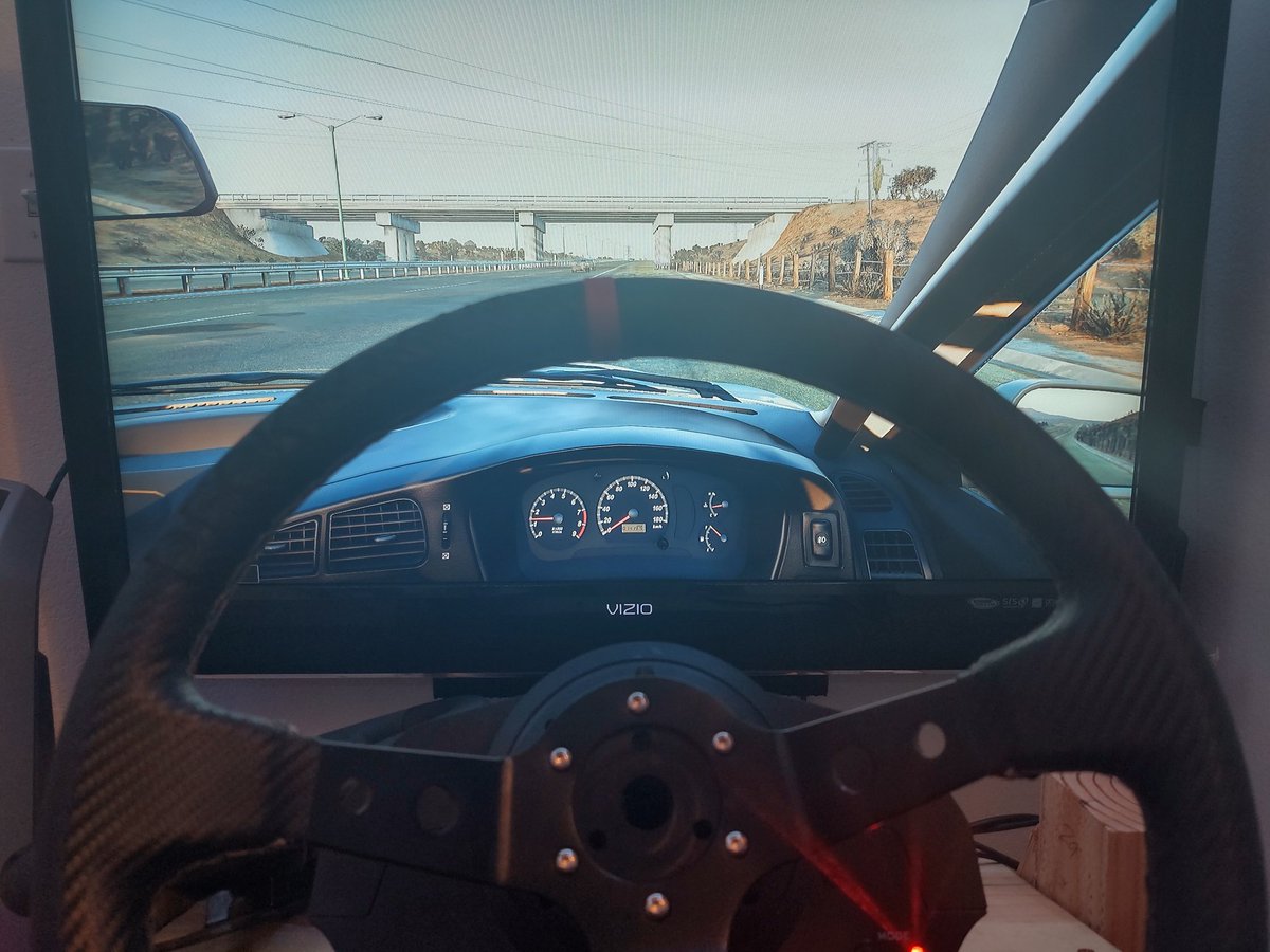 darthriley's tweet photo. Just finished building my racing sim. Yo @GoosiestYT rate my setup! https://t.co/yQya3EdsK9