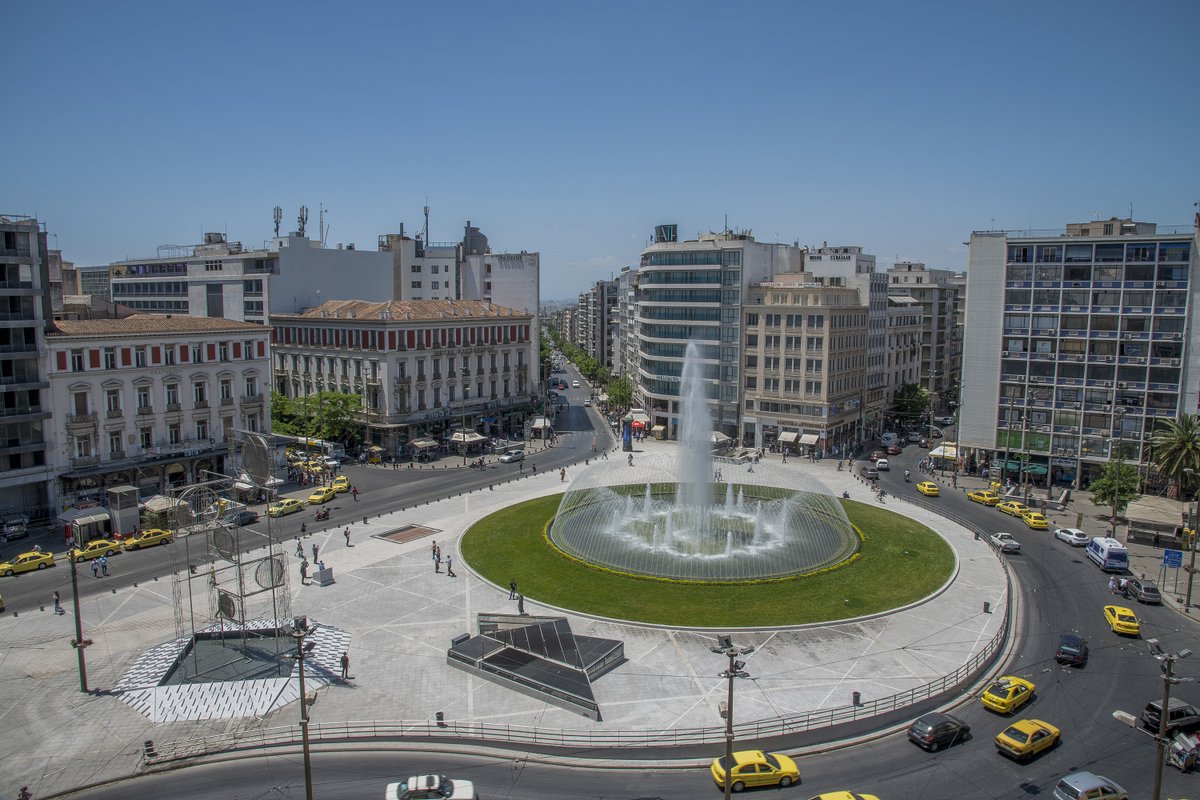 mythsofgreece's tweet photo. The newly designed Omonia Square in Athens with its beautiful fountain surrounded by restaurants and shops #greece #greek #omonia #holiday #athens https://t.co/jj22LOceHC