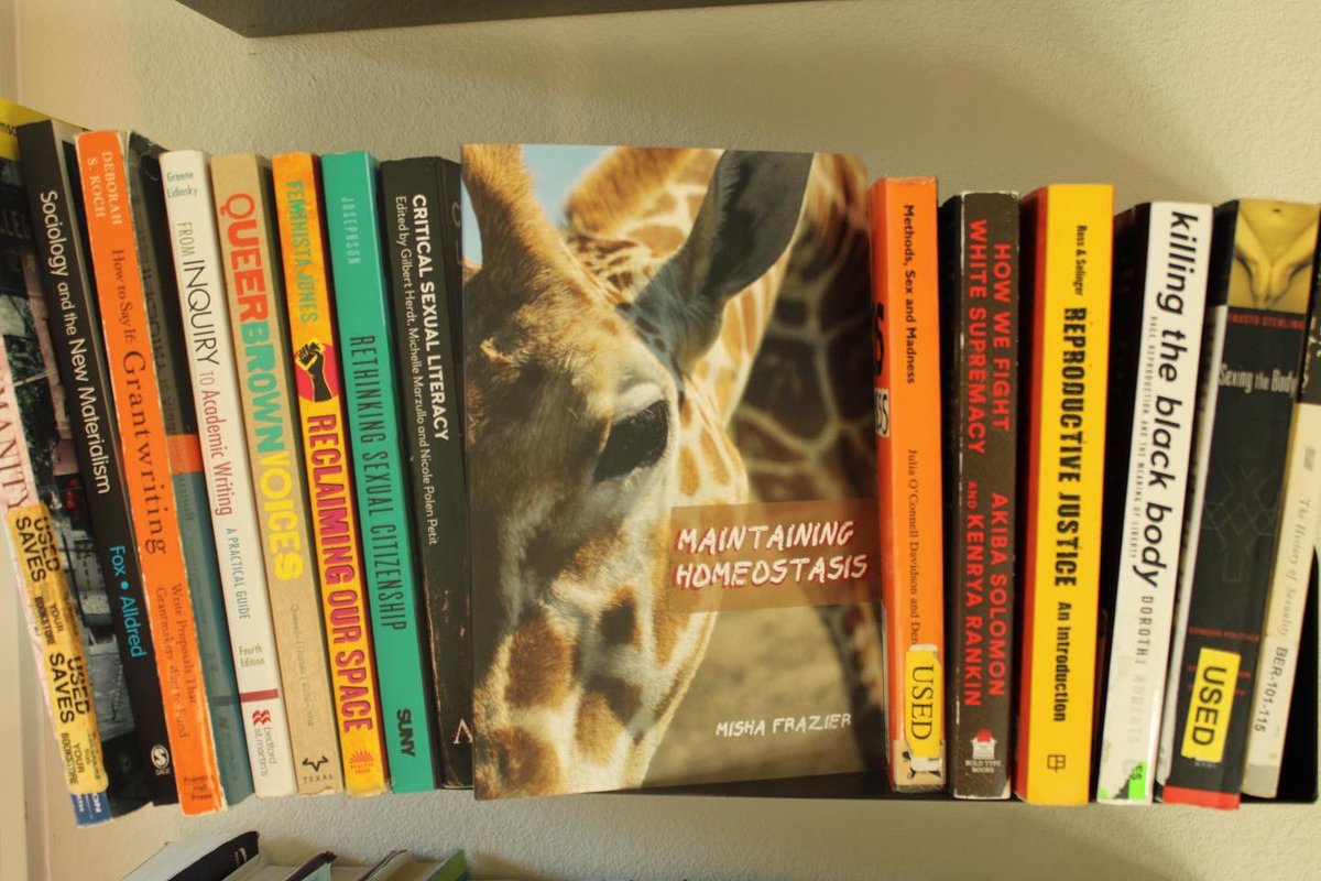Intersextional_'s tweet photo. What do you typically keep on your bookshelves? 

This one has a lot of sexuality, writing, empowerment works, and my newest collection of poetry!

You can preorder Maintaining Homeostasis to add to your bookshelf starting on 2.22.22!

It is definitely well worth the wait 🌻🧡🦒 https://t.co/XK7JtIzgGu