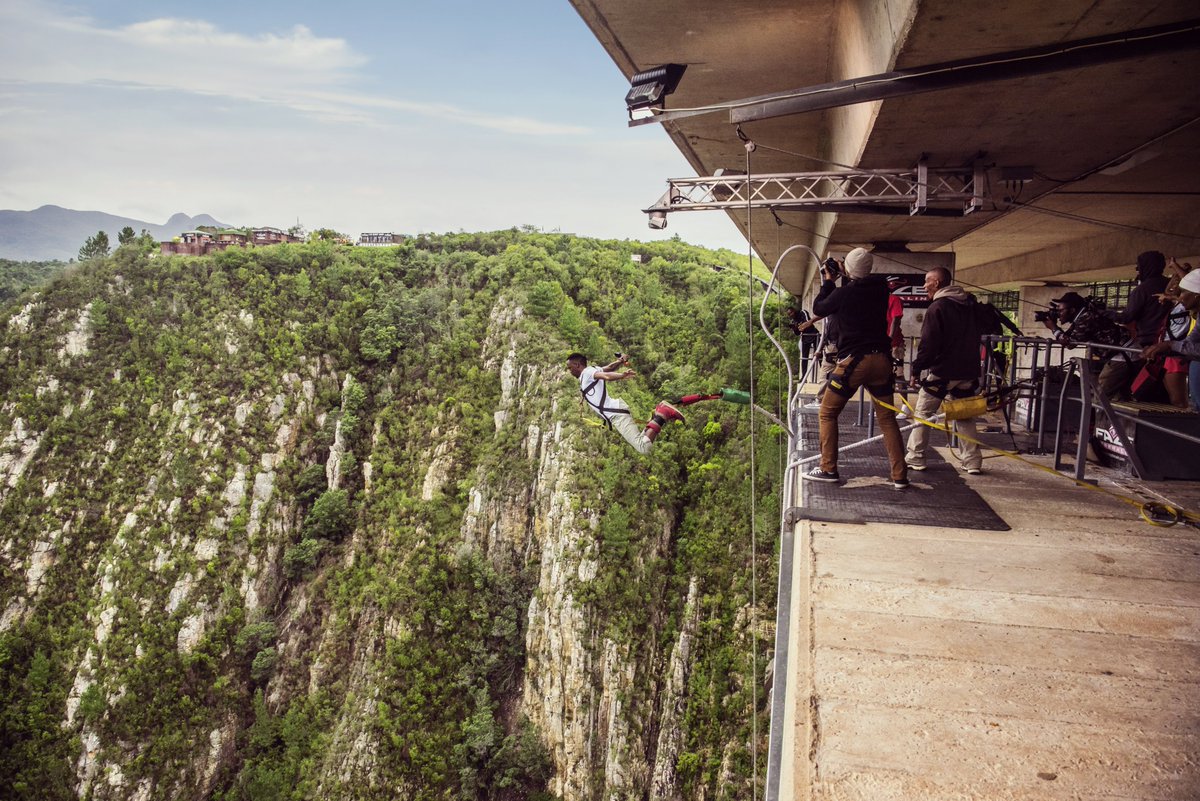 Take a leap of faith and jump off Bloukrans Bridge with <a href="/FaceAdrenalin/">Bloukrans Bungy - Face Adrenalin</a>! Recognised by the Guinness World Records as the world's highest commercial bungee jump at 216m, Bloukrans Bridge Bungy is right near the top of our bucket list! Is it on yours 🙃?