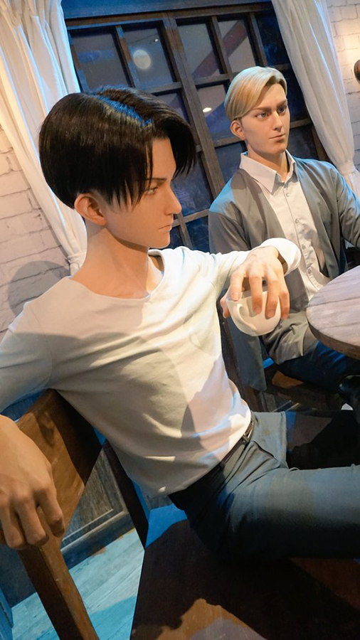 hourly_eruri's tweet photo. I find it so curious that Levi is practically sitting on the edge of the chair, as if he wants to be close enough to Erwin, I mean look at his shoe is rubbing Erwin's leg lol https://t.co/cZ6Q48rXzb