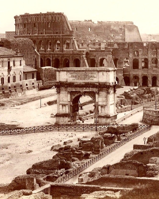 Photo of the Colosseum and Arch of Titus