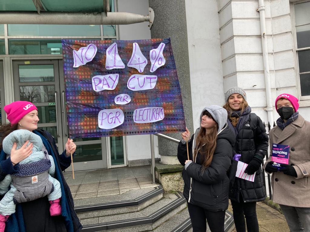 PGR lecturers opposing a proposed downgrading and 14% pay cut <a href="/uniofbrighton/">University of Brighton</a> This is why we need national agreements to rid our sector of the scourge of casualisation, exactly what the #FourFights dispute is about! #OneOfUsAllOfUs #UCUStrike #UCUStrikes