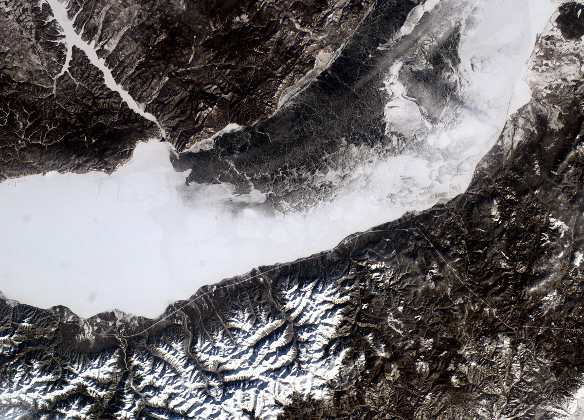 Alexindia1's tweet photo. #EarthKAM images from ISS. Misson 77. The black zone on the Baikal Lake is clear snowless ice cover. Schoolkids from Krasnoyarsk, Yakutsk and MAI students. https://t.co/TaWXZpo5zv