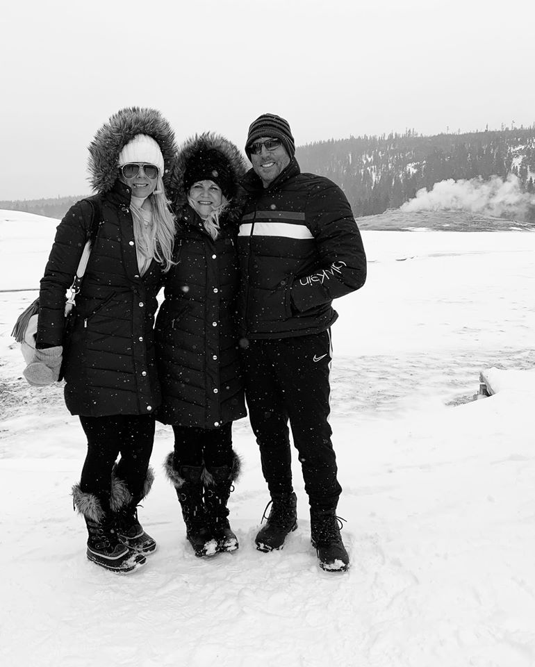 A photo of our customers on a van tour to Yellowstone! It looks COLD, but if you dress appropriately, you will stay warm! For more information on snowmobile trips and van tours to Yellowstone, go to: Scenic-Safaris.com #wyoming #winter #winterfun #vacation #adventure