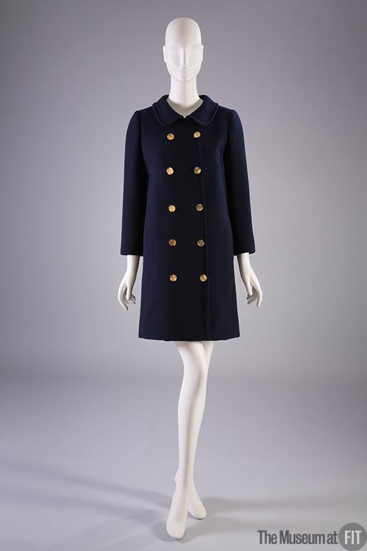 The double-breasted coat was one of Yves Saint Laurent's signature styles. Originally inspired by the naval “peacoat” worn by sailors, the recognizable dark blue coat punctuated by gold-tone buttons has become a fixture of fashionable wardrobes. #MuseumTwosDay #MuseumAtFIT