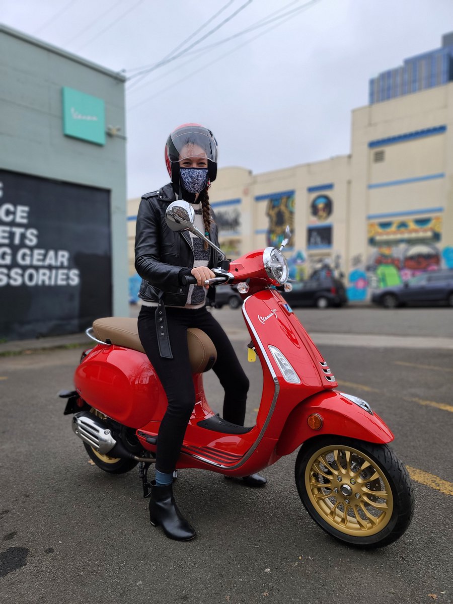 VespaPortland's tweet photo. Elise was determined to get her motorcycle endorsement so she could finally ride her dream Vespa. She had a unique vision for what she wanted it to look like, and it turned out amazing! She rode into the sunset on her Primavera (RED) 150 with gold rims, tan seat, and a red helmet https://t.co/o88RIfjksz