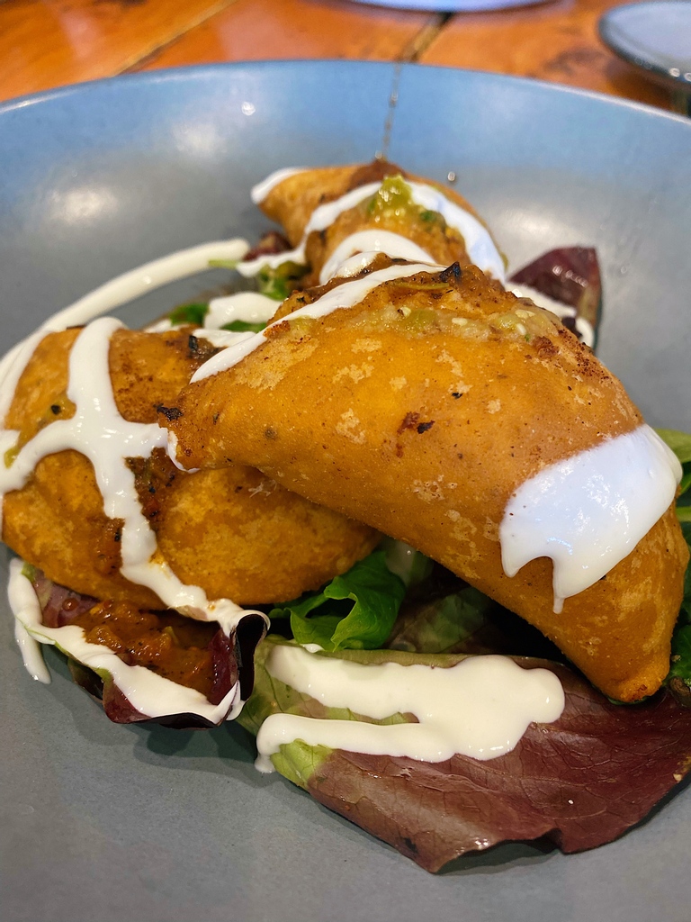 Our goal at Kitchen Table is to have you leaving stuffed and full like our empanadas! 

📸 Empanadas | Zucchini, corn, roasted poblanos, black beans, oaxacan cheese, salsa verde, salsa árbol, crema

#KitchenTable #VegasBrunchSpots #LetsBrunch #BreakfastFoods #Empanadas