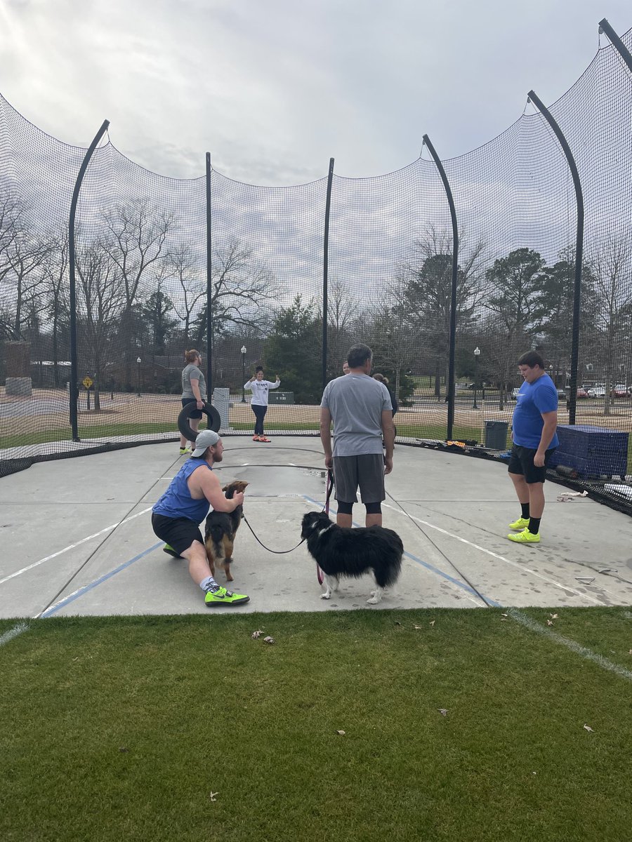 BerryXCTF's tweet photo. Best Throw days are the ones when the furry four-legged assistant coaches come to practice. 🐕🦮 #WeAllRow https://t.co/jk7DI9tlnd