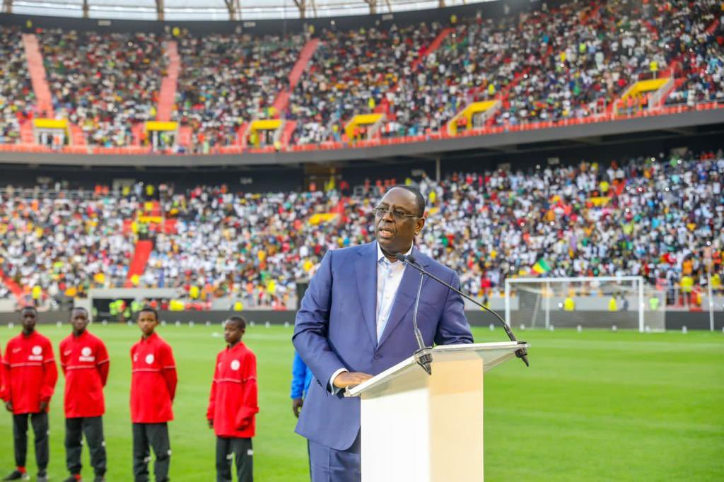 PR_Senegal's tweet photo. Le chef de l’Etat @Macky_Sall a inauguré ce mardi 22 février 2022 le Stade du Sénégal de Diamaniadio. 
Ce joyau qui porte désormais le nom de l’ancien Président Me Abdoulaye Wade est une infrastructure offerte en cadeau à la jeunesse sénégalaise. https://t.co/9IHu8N7lAY