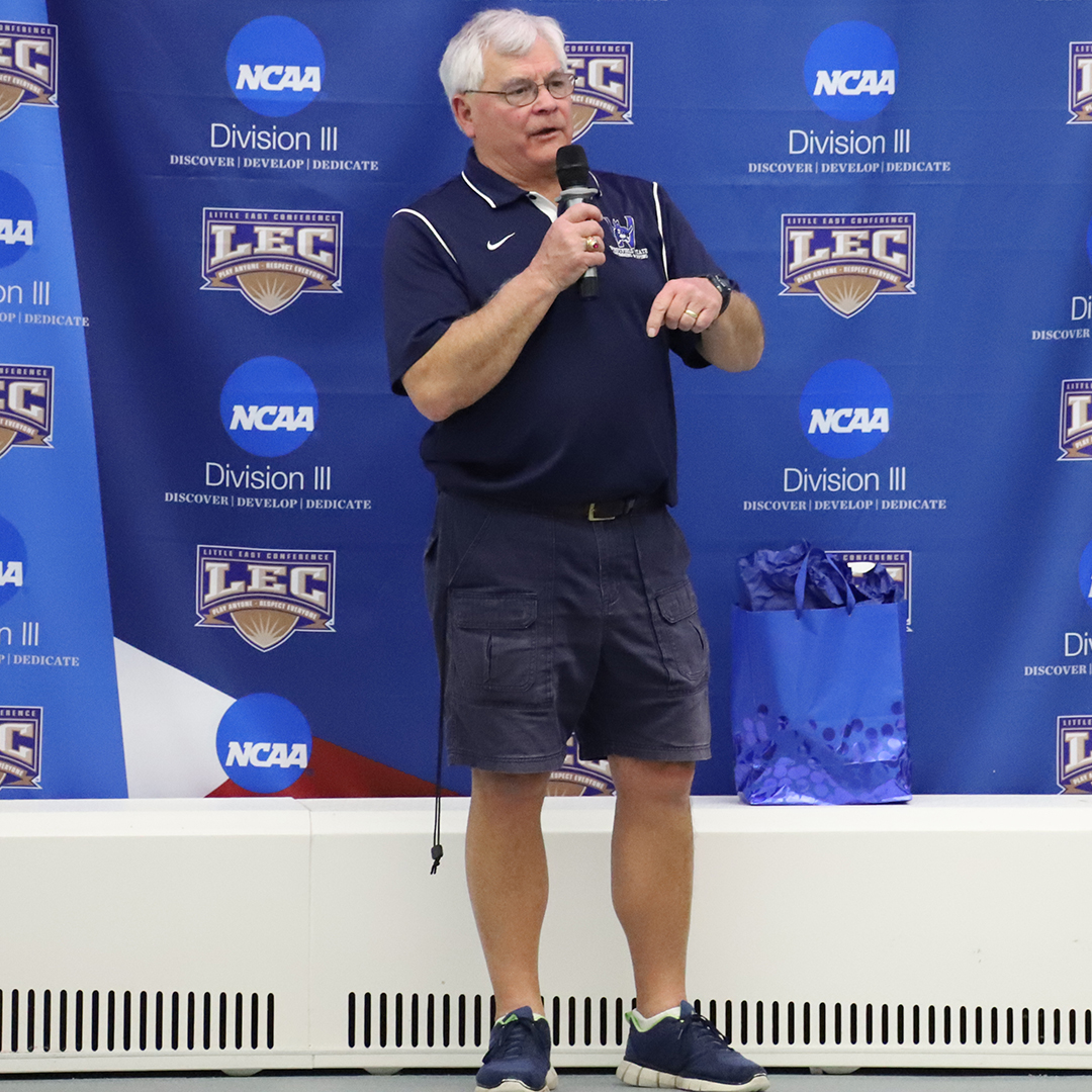 LittleEastConf's tweet photo. Prior to the start of tonight's finals session the #LECswim head coaches pair tribute to @WestfieldOwls head coach Dave Laing, who is retiring after an outstanding 40-year career. Congrats on your retirement, Dave! #LECchamps #Legend #NCAAD3 @NCAADIII @d3sports @CSCAA https://t.co/AipqUS5nOj