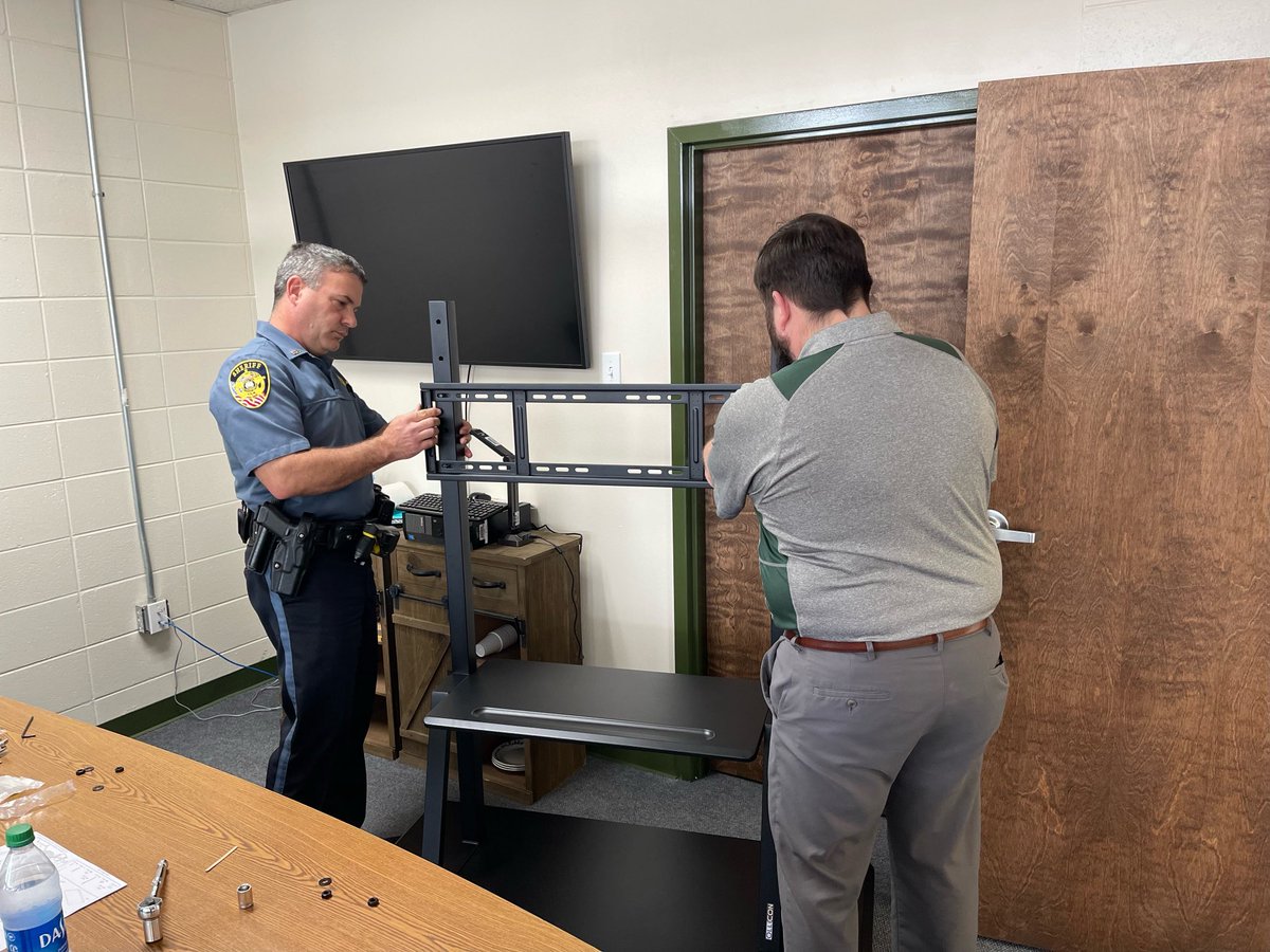 JolieG1's tweet photo. SRO Brandon Flowers helps Principal Josh Martin put together Newline Panel Carts for French Settlement Elementary 💚💛 #TeamWork #NewlinePanels ⁦@tech_parish⁩ ⁦@LPPS_EdTech⁩ ⁦@Livingston_PPS⁩ ⁦@SheriffJasonArd⁩ ⁦@Stacyjemison77⁩ https://t.co/cavW9GuBLt