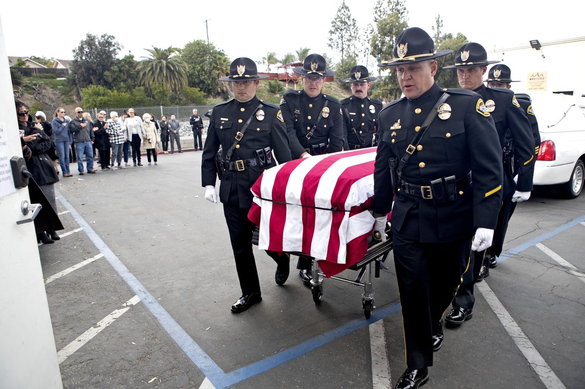 raulroa's tweet photo. Body of fallen @CityofHBPIO @HBPoliceDept #NicholasVella arrives at funeral home in La Habra. FD &amp; PD officers stood at attention as the hearse drove into the parking lot. Family members following the hearse thanked everyone standing on the street. @TheDailyPilot  @latimes https://t.co/a7s4NkBaZR