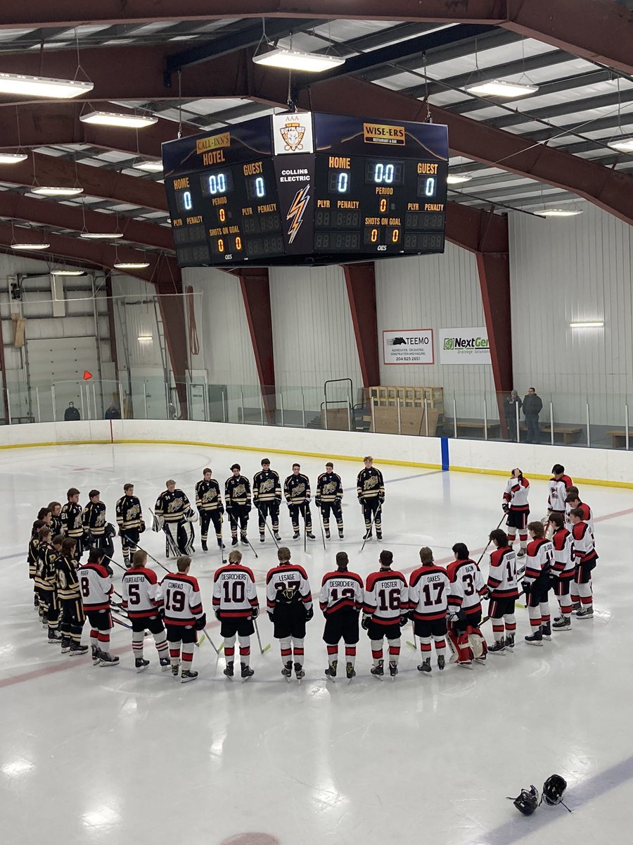 ZoneIVMustangs's tweet photo. Before the game tonight, the Mountain Mustangs and Pembina Tigers paid tribute to the memory of #8 Danny Lints from the Pembina Tigers. Touching moment for the local and hockey community. #BuddyCheck https://t.co/gZUUXKmKlB