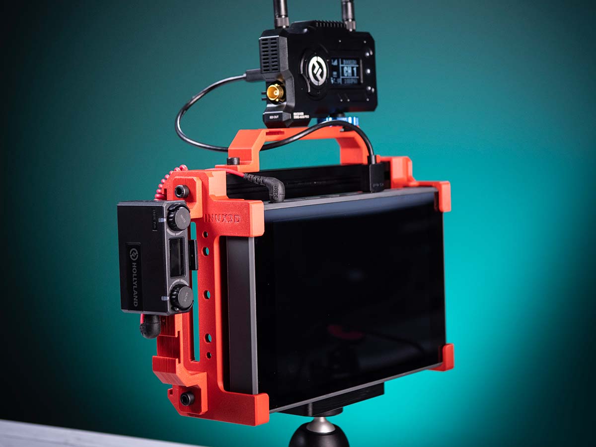 YoloLivTech's tweet photo. It's here! The new PK1 cage for the YoloBox! 
 
This cage is the mobile complement to the desktop version of the stand.
 
Get yours from @aaronpk_tv and @inux3d 
link: https://t.co/m9qQ0gQ6zA
 
#pk1stand #streamingrig #mobilestreaming #yolobox #livestreaming https://t.co/KVll8MGDHC