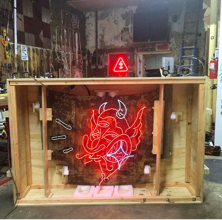 Here's a piece <a href="/yokyokker/">yok 💛🏠</a> and i designed a couple of years ago. We actually went to a car scrapyard and pulled out that car hood for the piece, it was also sweltering HOT that detroit summer. Collaboration with George Vidas. Love working with neon!!!