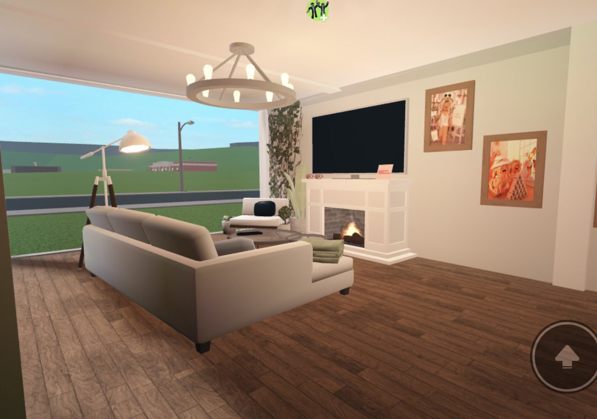 eeveemog's tweet photo. Modern living room ⚡️
(Don’t miss the rest of the house in the background it wasn’t finnished) 
.
.
.
Tags: #welcometobloxburg #bloxburgbuilds https://t.co/BDWYMlOpX2